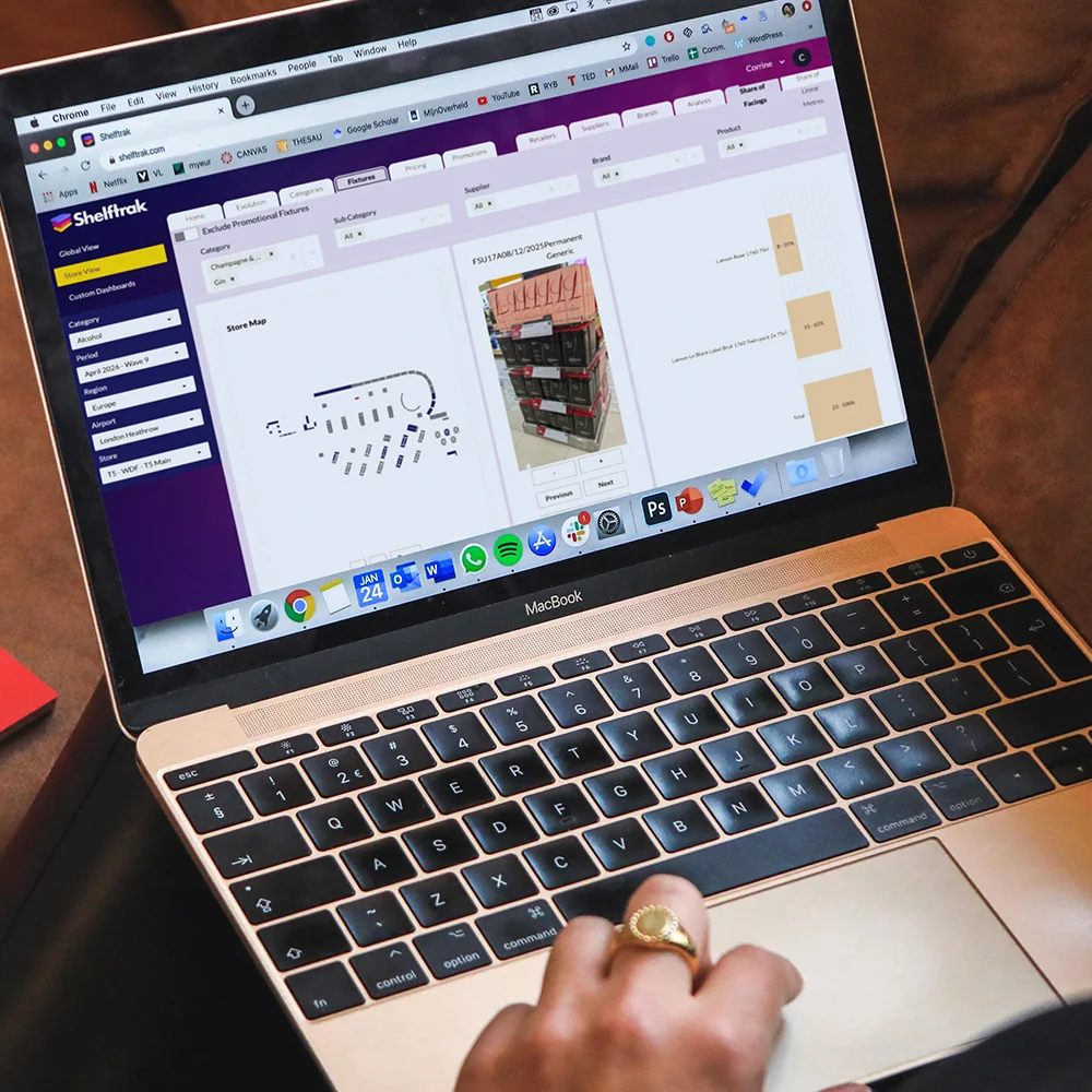 A laptop showing a Shelftrak store map beside a fixture photograph
